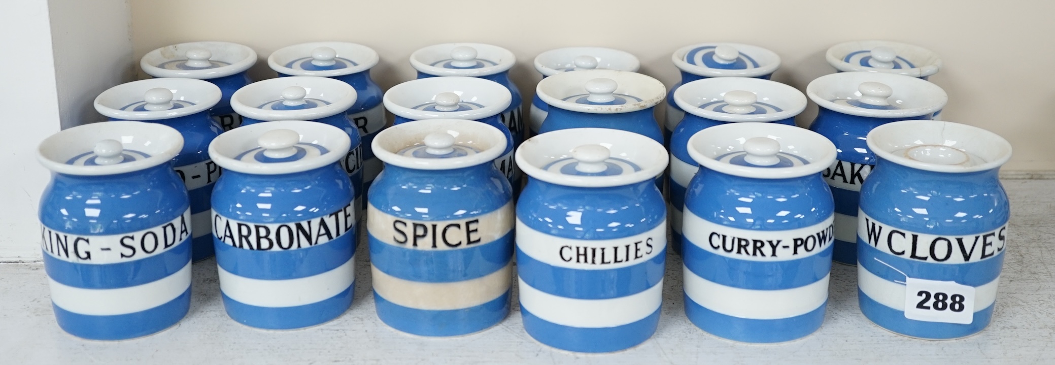 T.G.Green Cornish Kitchenware, eighteen 8.5cm lidded storage jars to include Curry Powder, Baking Soda, Candied Peel, Chillies, Pimento and Arrowroot, mixed marks. Condition - poor, fair and good